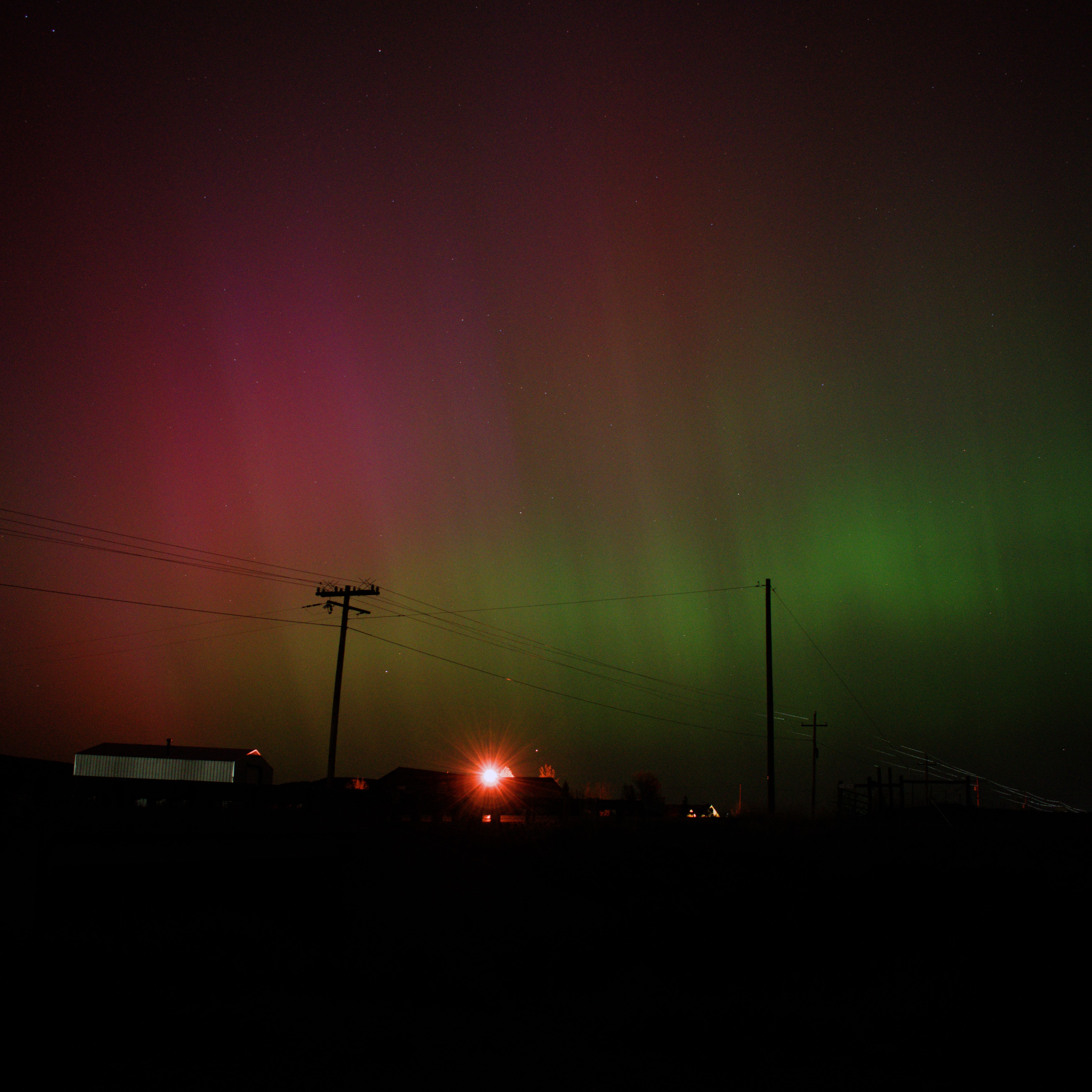 Northern Lights (Aurora Borealis) with Barn and Bridge taken from Northern Colorado by Kaden Salazar